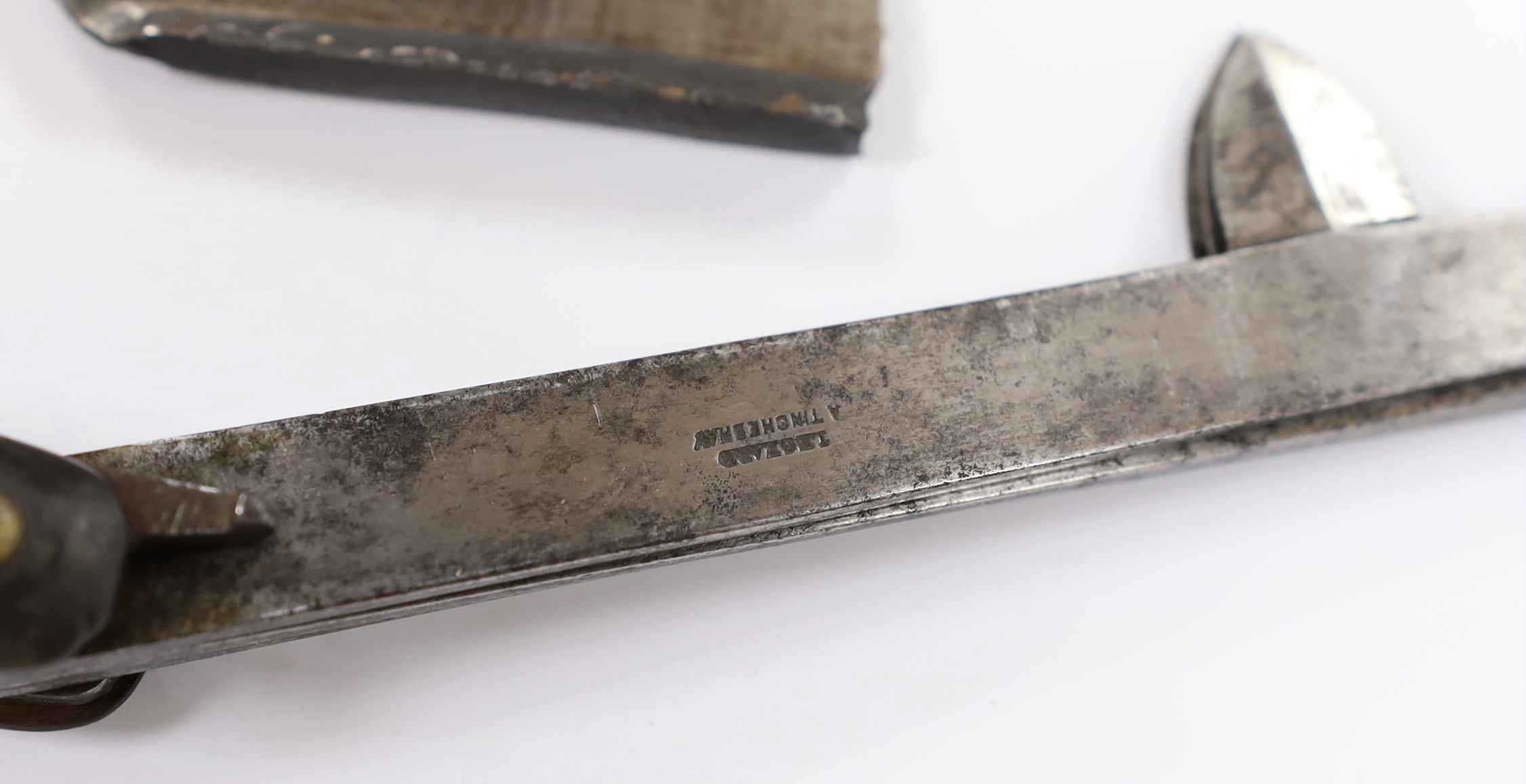 A 19th century multi tooled horn fleam and an open bladed fleam type tool, longest 12cm folded